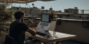 a man working at the rooftop on a summer